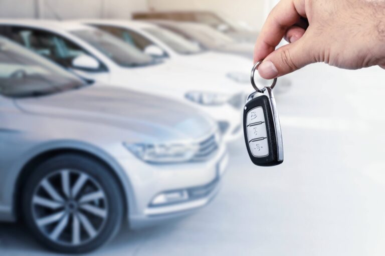 A man holding car keys