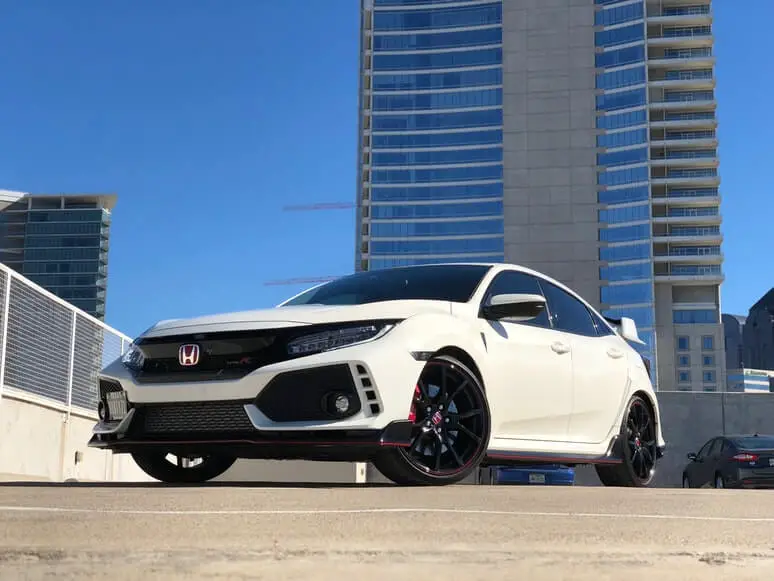 White Honda on a parking lot