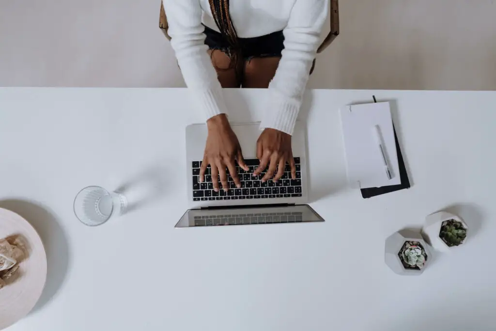 A woman uses a laptop